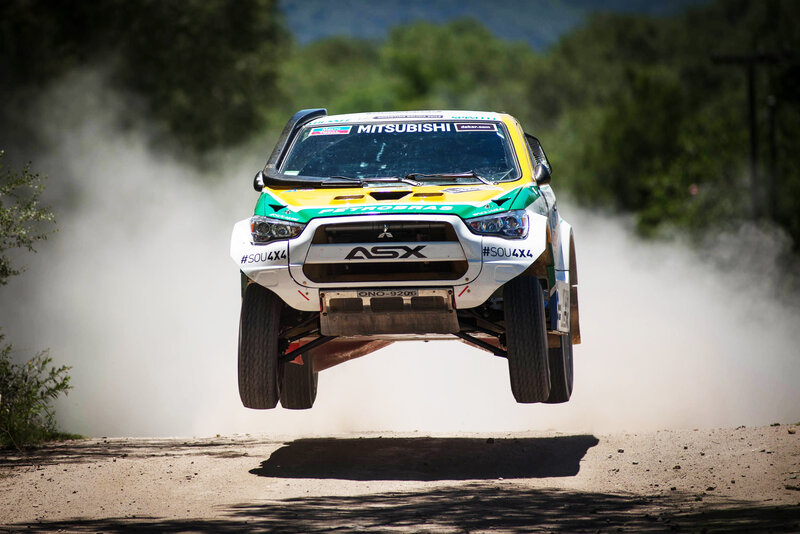Rally car in mid-air jump