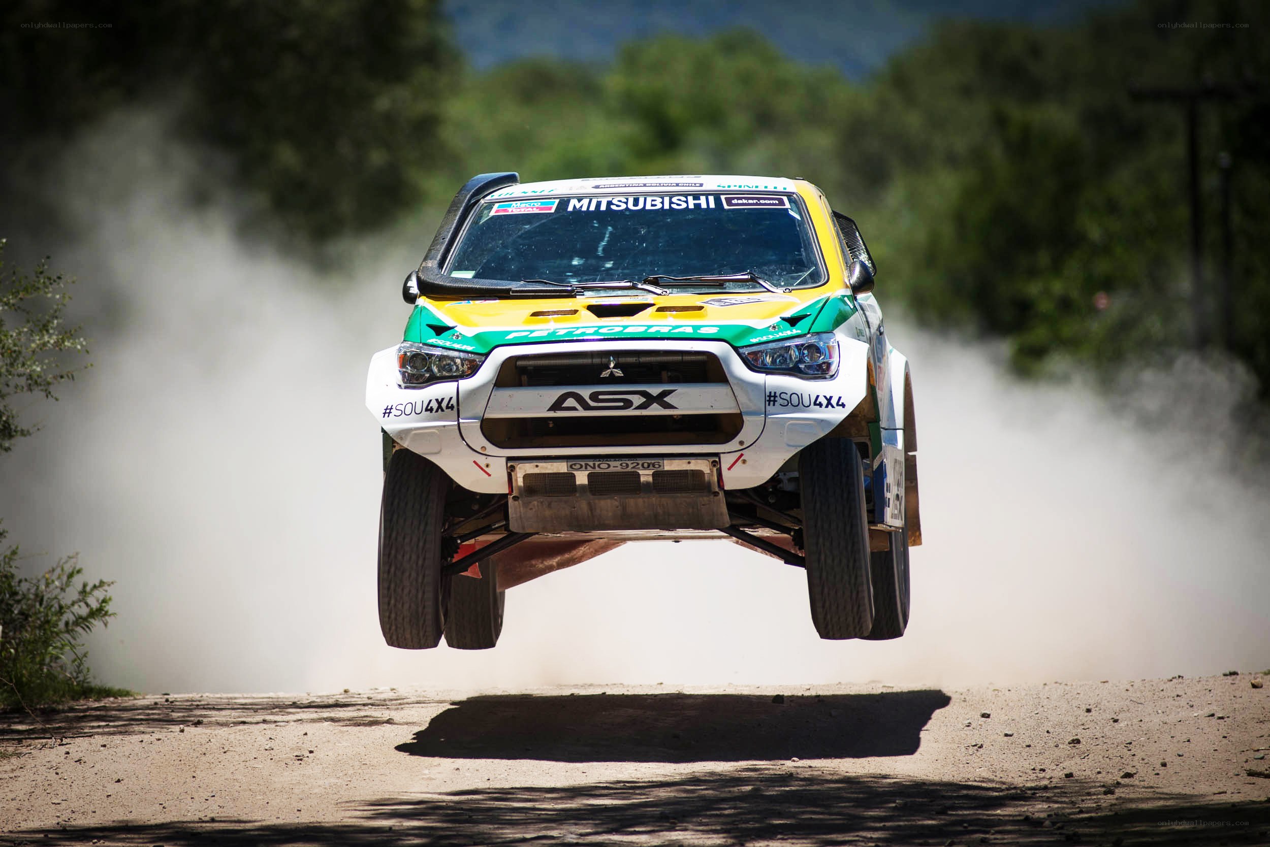 Rally car in mid-air jump