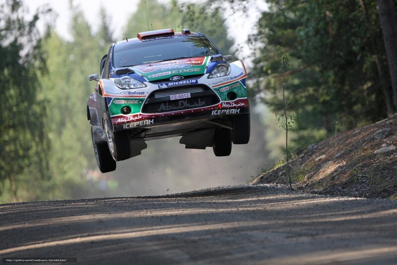 Rally car in mid-air jump