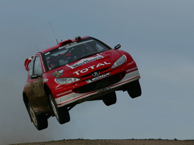 Rally car in mid-air jump