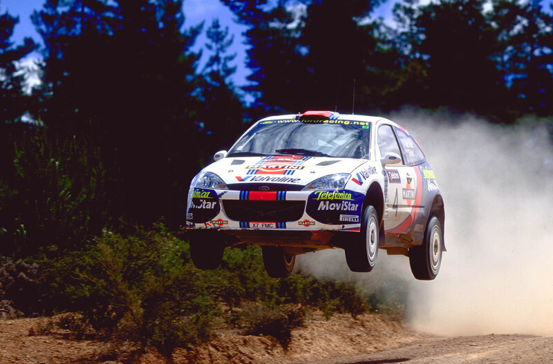 Rally car in mid-air jump