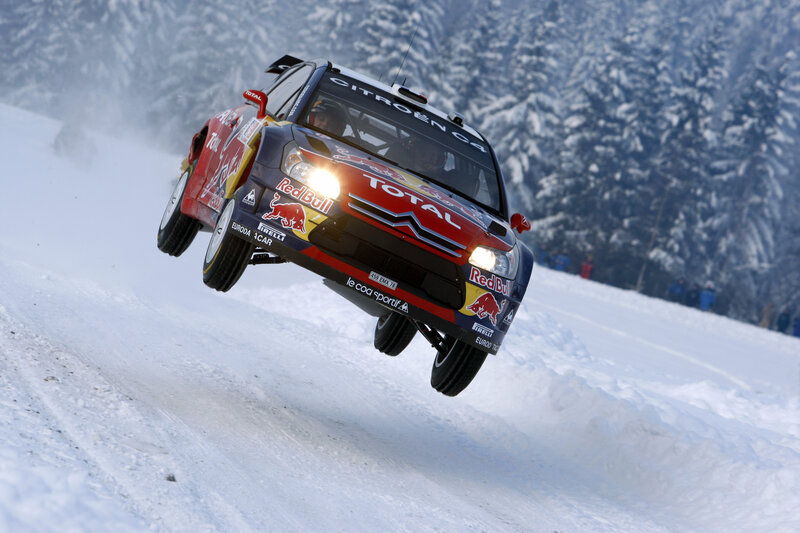 Rally car in mid-air jump