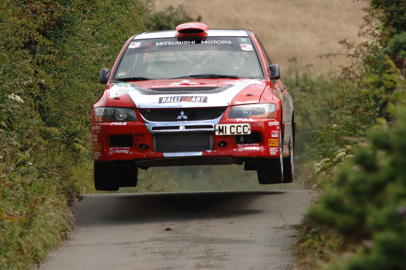 Rally car in mid-air jump