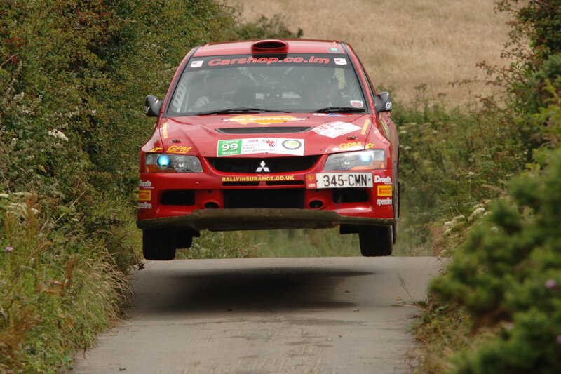 Rally car in mid-air jump