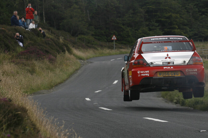 Rally car in mid-air jump