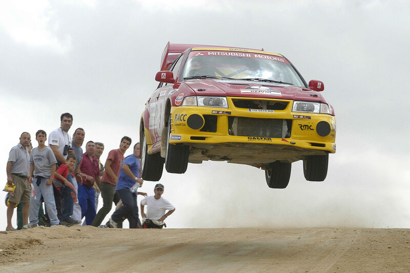 Rally car in mid-air jump