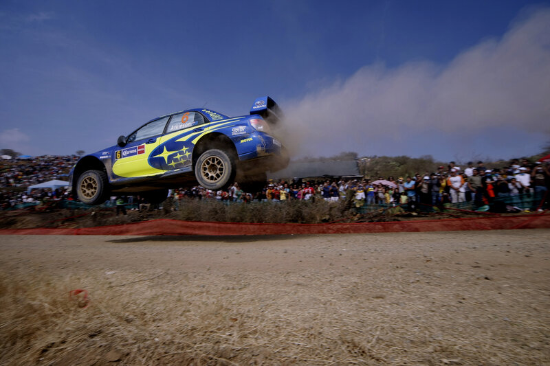 Rally car in mid-air jump