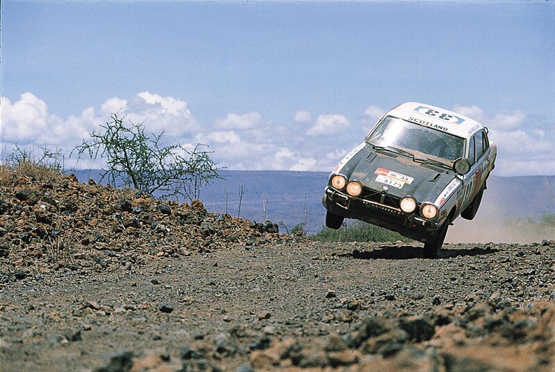 Rally car in mid-air jump