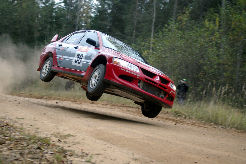 Rally car in mid-air jump