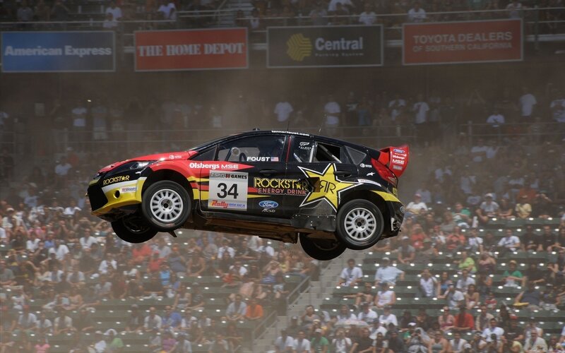 Rally car in mid-air jump