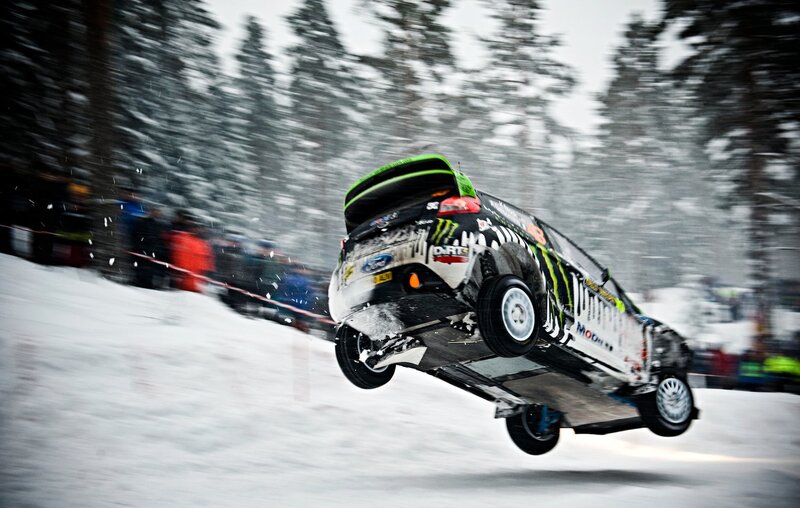Rally car in mid-air jump