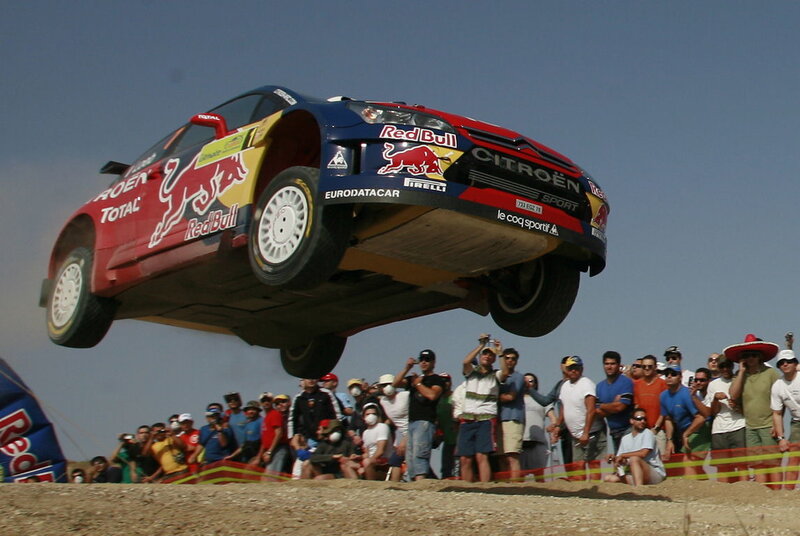 Rally car in mid-air jump