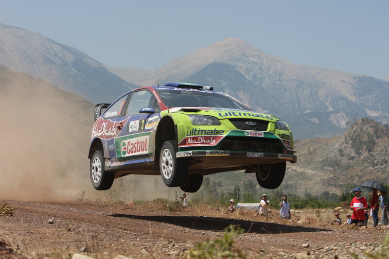 Rally car in mid-air jump
