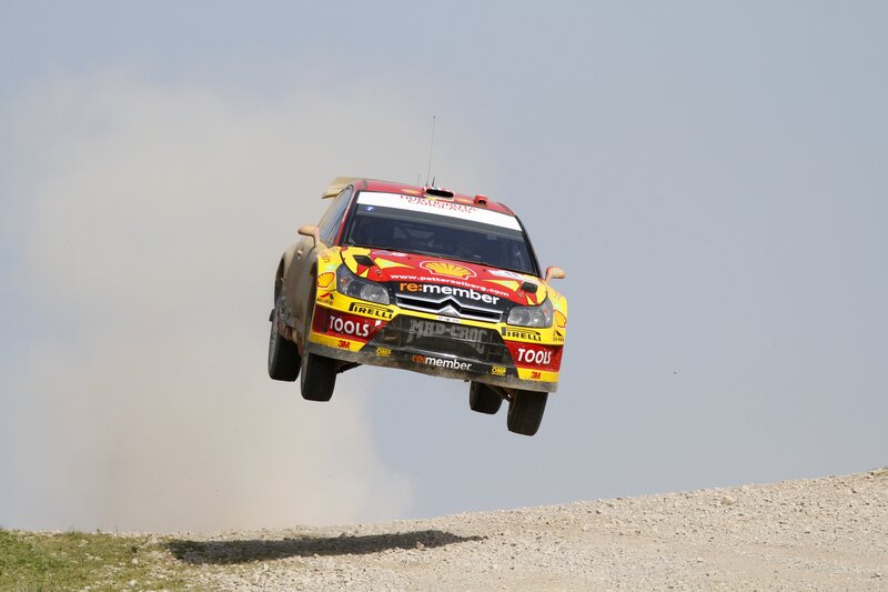Rally car in mid-air jump