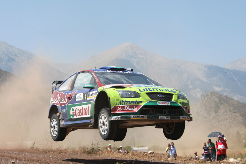Rally car in mid-air jump