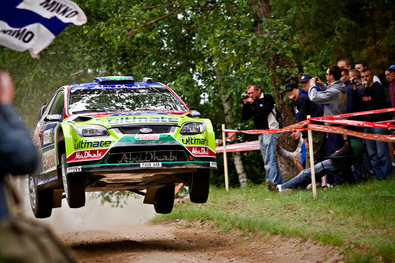 Rally car in mid-air jump