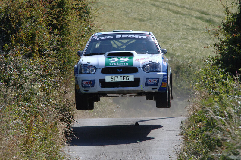 Rally car in mid-air jump