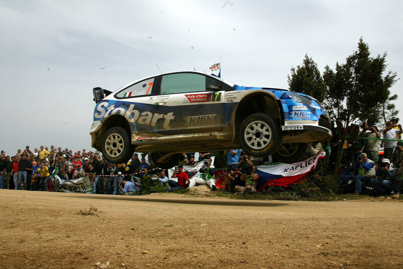 Rally car in mid-air jump