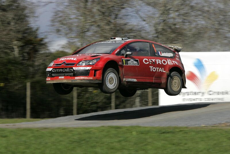 Rally car in mid-air jump