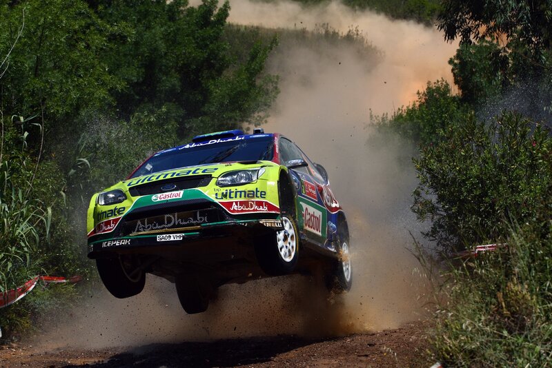 Rally car in mid-air jump
