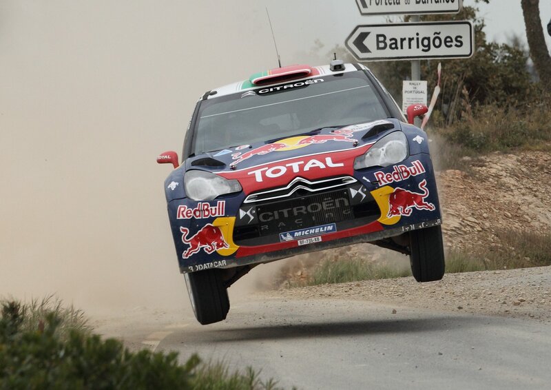 Rally car in mid-air jump