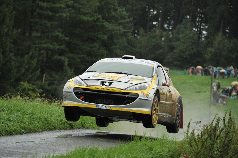 Rally car in mid-air jump