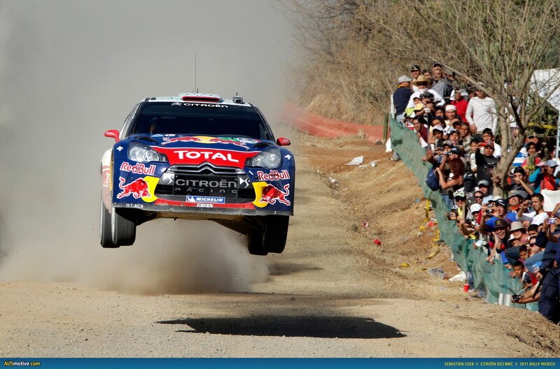 Rally car in mid-air jump
