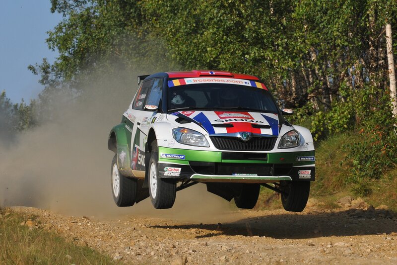 Rally car in mid-air jump