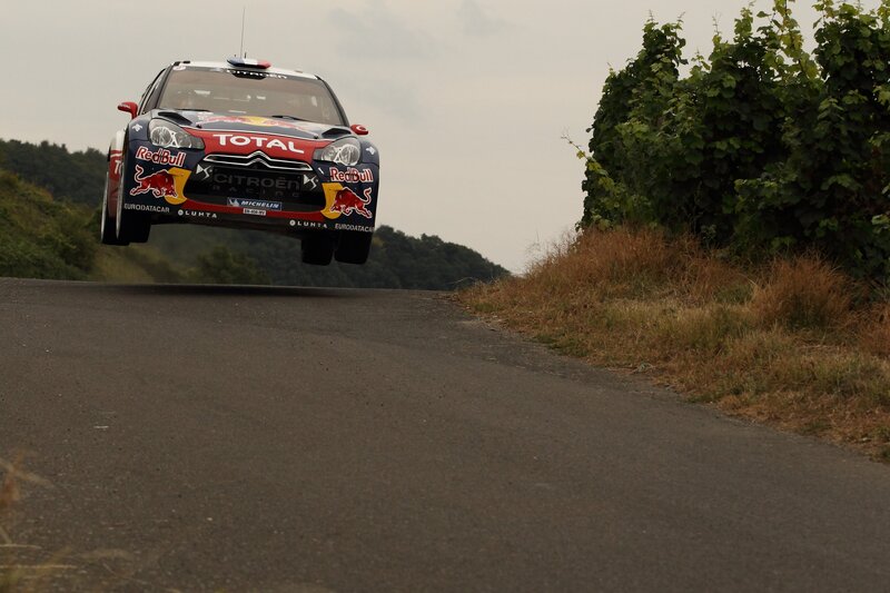 Rally car in mid-air jump