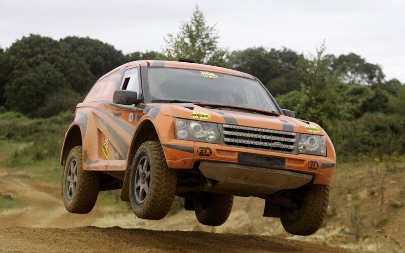 Rally car in mid-air jump