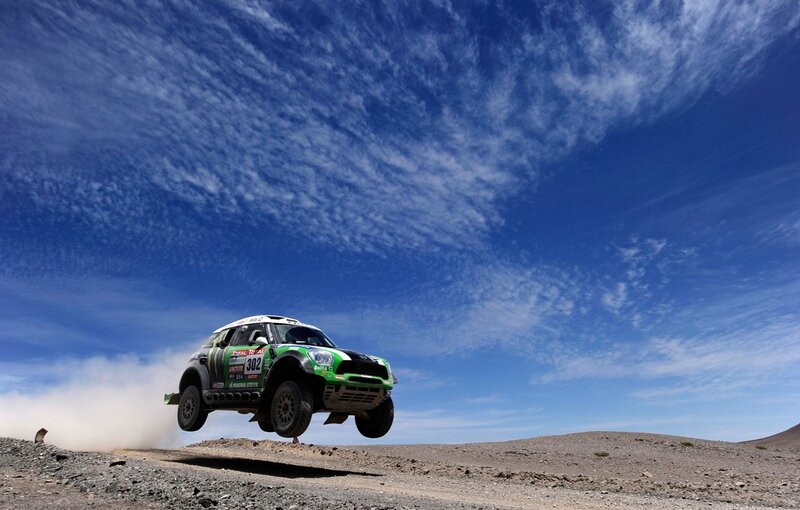 Rally car in mid-air jump