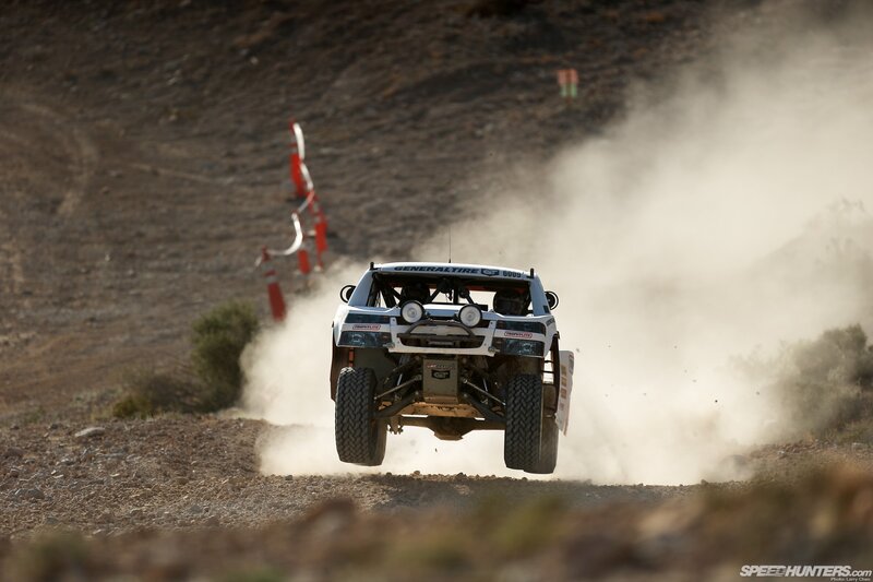 Rally car in mid-air jump