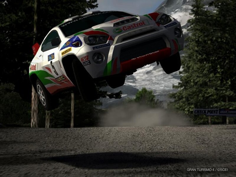 rally car in mid-air jump