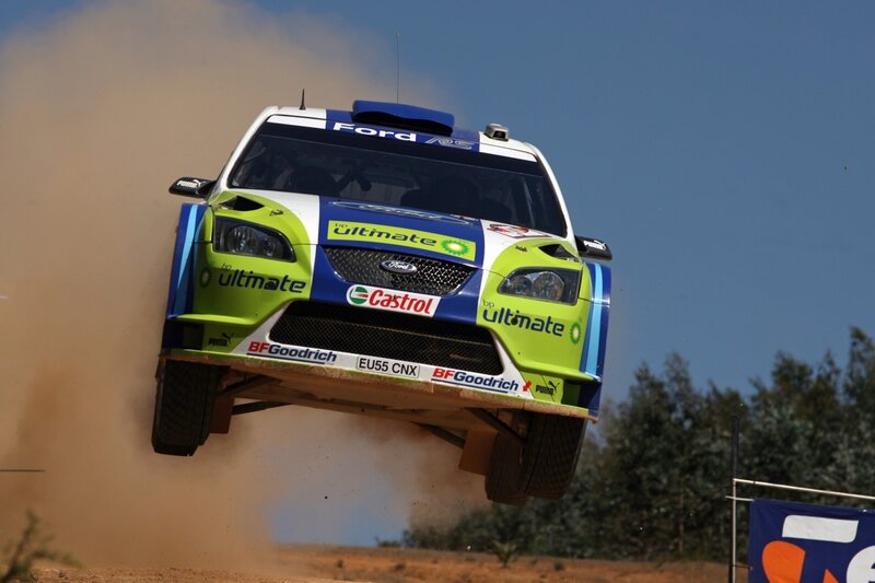 Rally car in mid-air jump