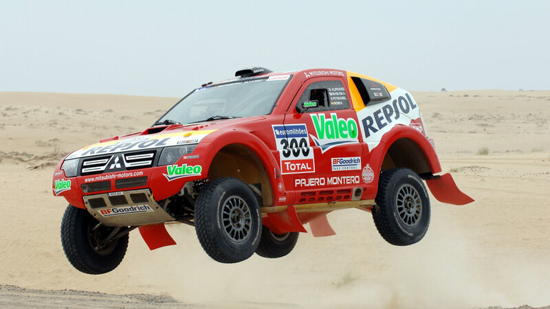 Rally car in mid-air jump
