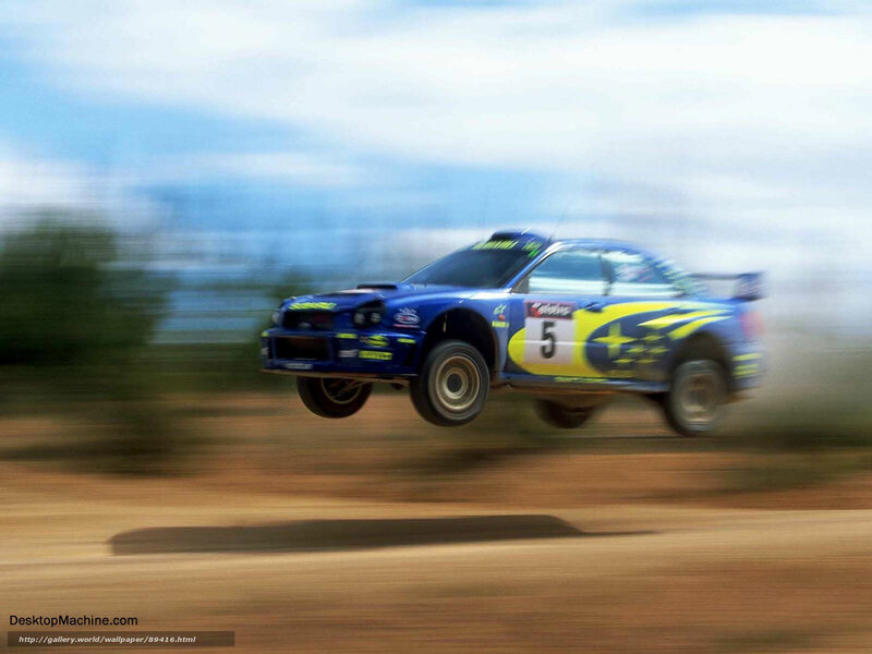 rally car in mid-air jump