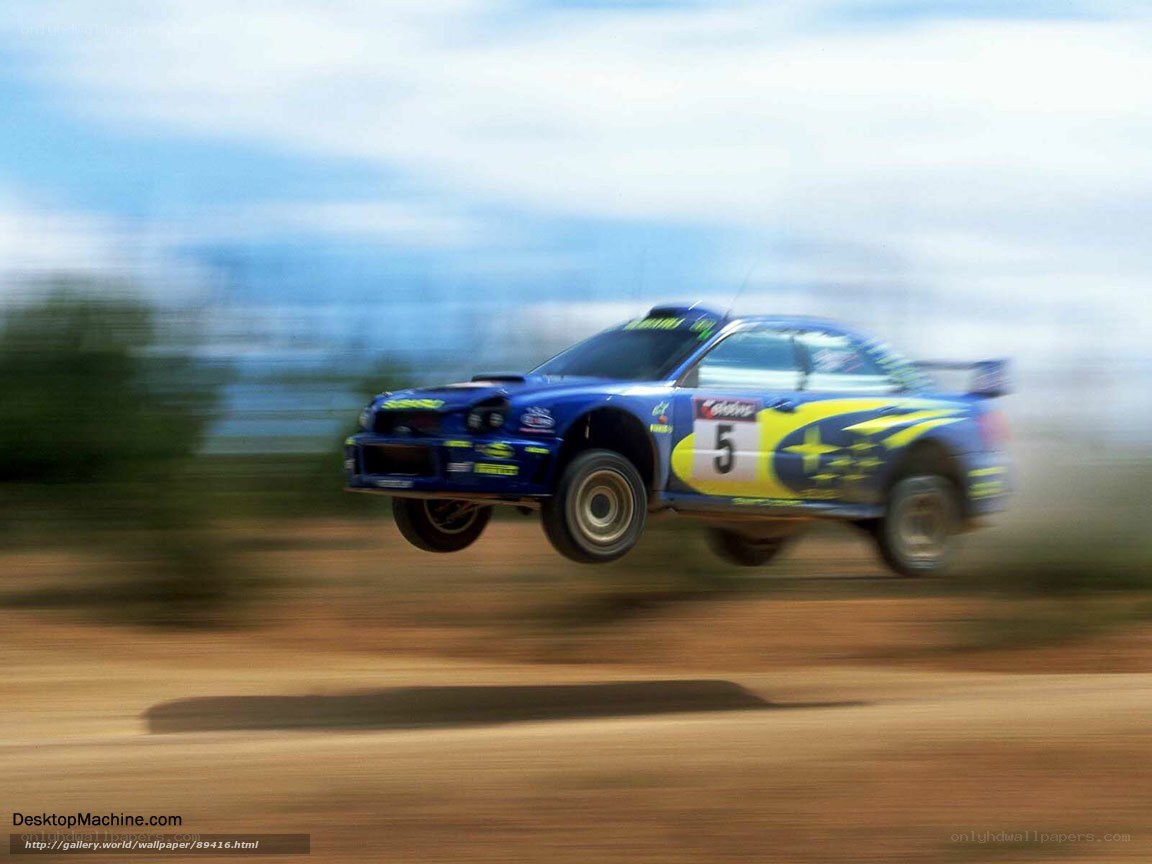 rally car in mid-air jump