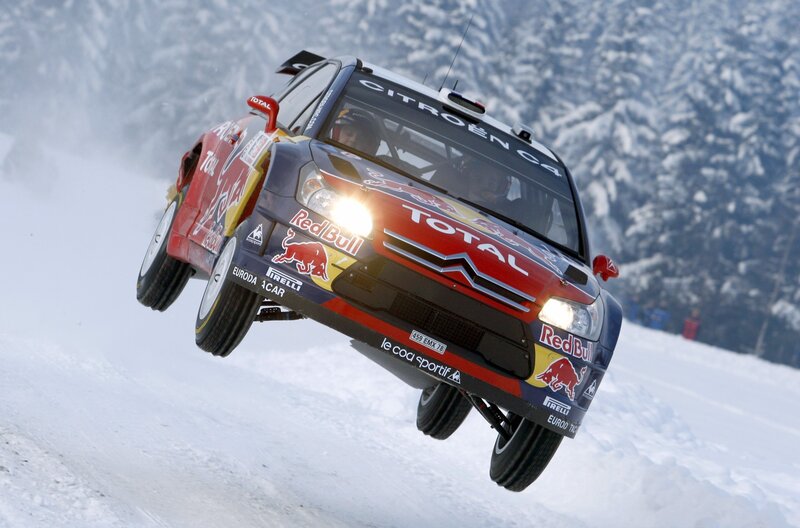 Rally Car in Mid-air — White, Dramatic, Winter, Photograph
