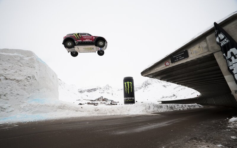 Rally Car in Mid-air — White, Dramatic, Winter