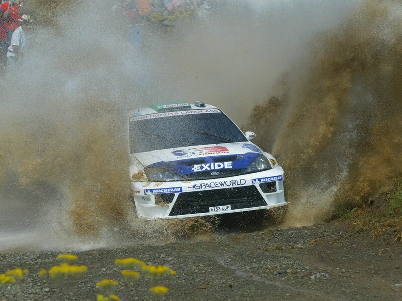 Rally Car in Mud — White, Dynamic