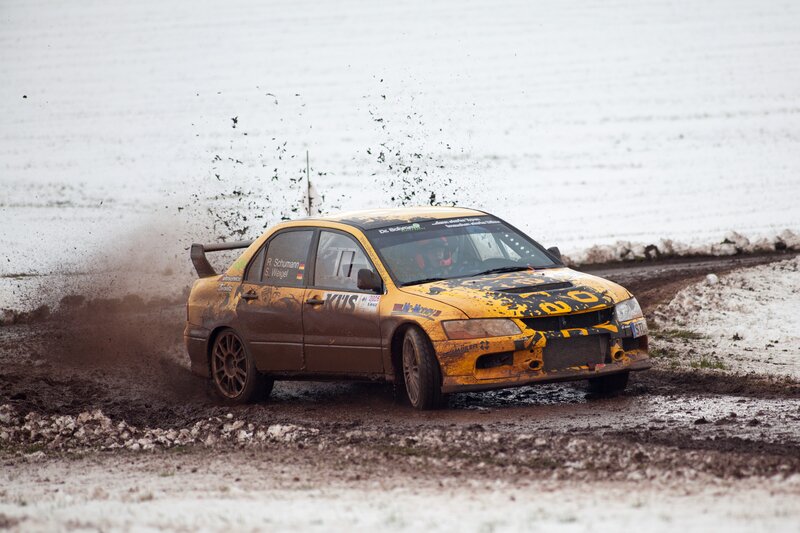 Rally Car in Mud — Yellow, Dynamic