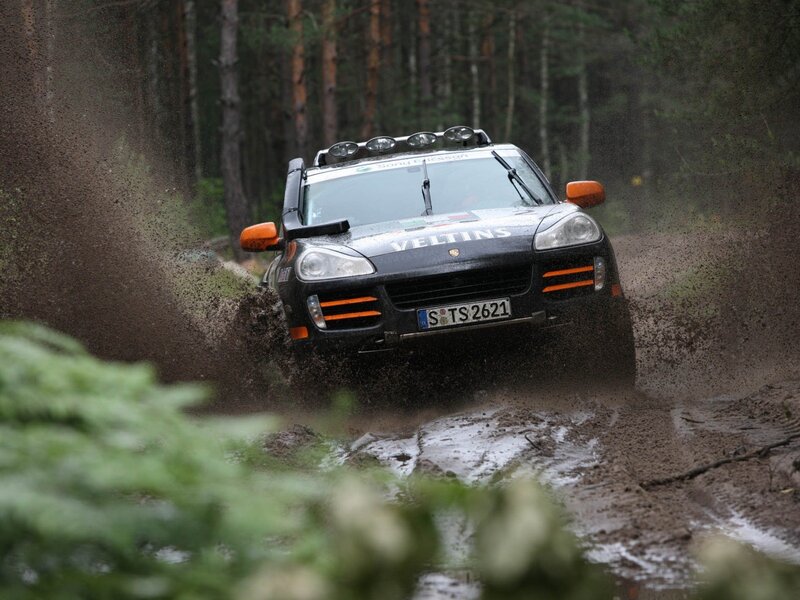 Rally car in muddy forest