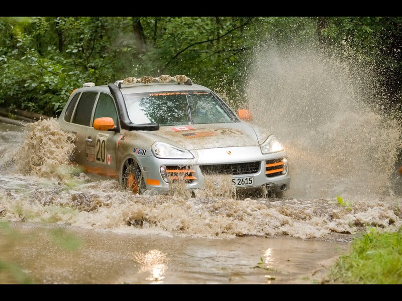 rally car in muddy water