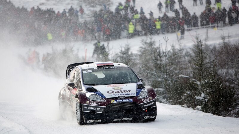 Rally car in snowy conditions