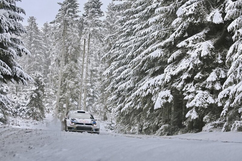 Rally car in snowy forest