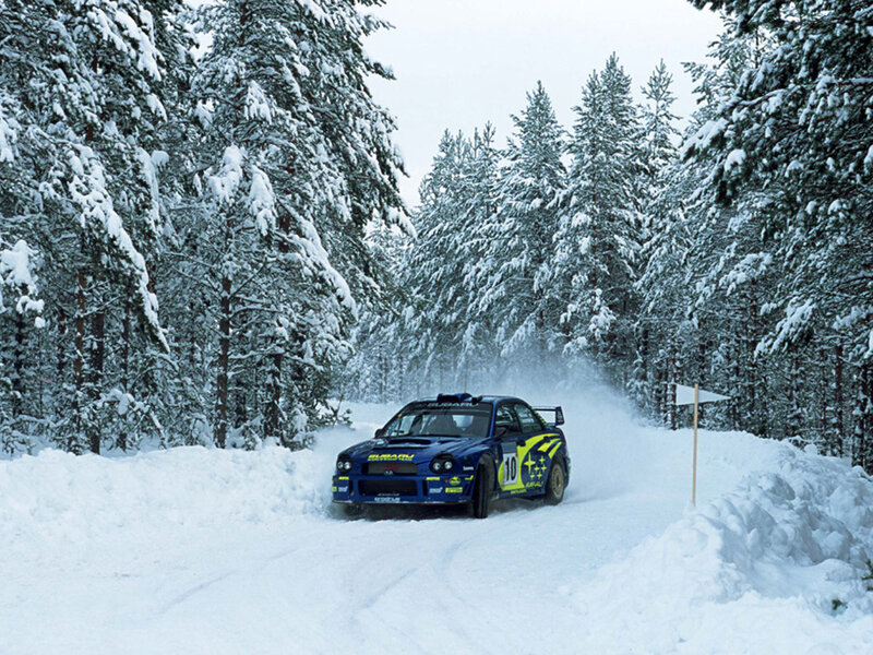 Rally car in snowy forest