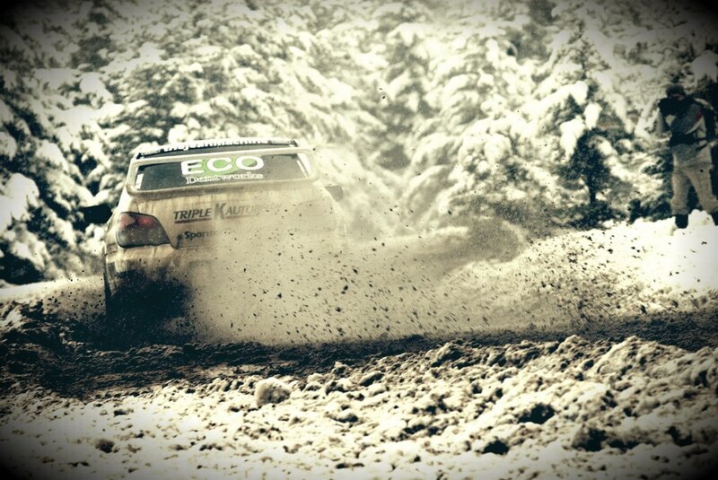 rally car in snowy forest