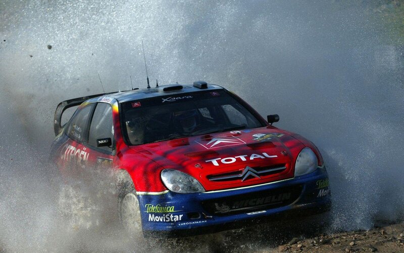 Rally Car in Water — Red, Dynamic, Afternoon