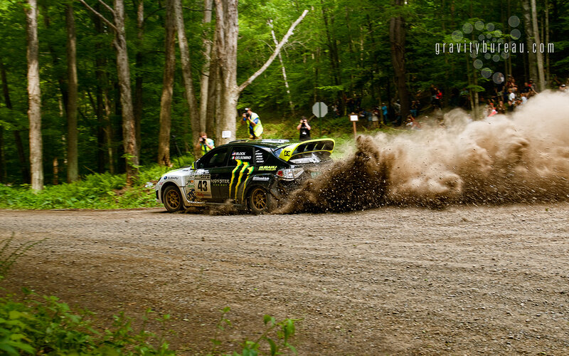 Rally car kicking up dirt