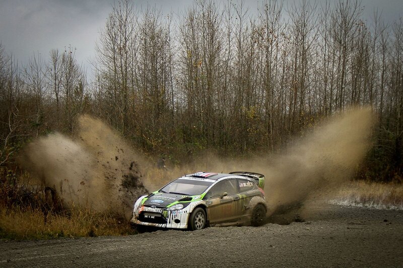 rally car kicking up dust
